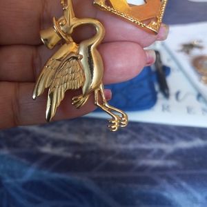 Stork brooch